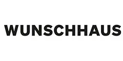 Das Wort WUNSCHHAUS ist in fetten, schwarzen Großbuchstaben auf weißem Hintergrund dargestellt.